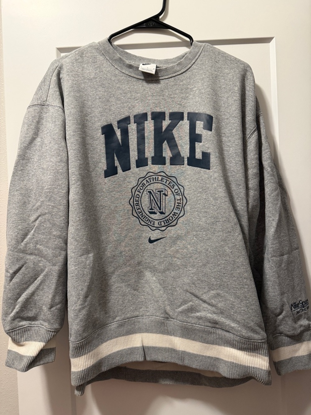 Nike Gray Crewneck Sweatshirt with Navy Logo and Cream Stripes